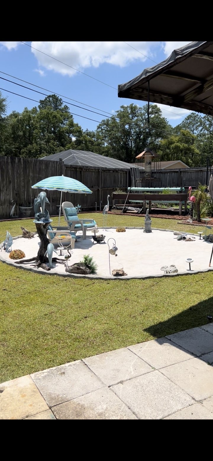 Completed backyard seating area following structure removal
